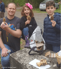 Family with girl and boy with morel finds